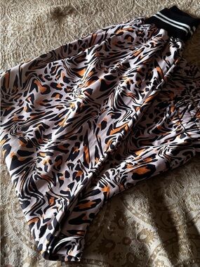 Animal Print Jogger Pants in Black and Orange